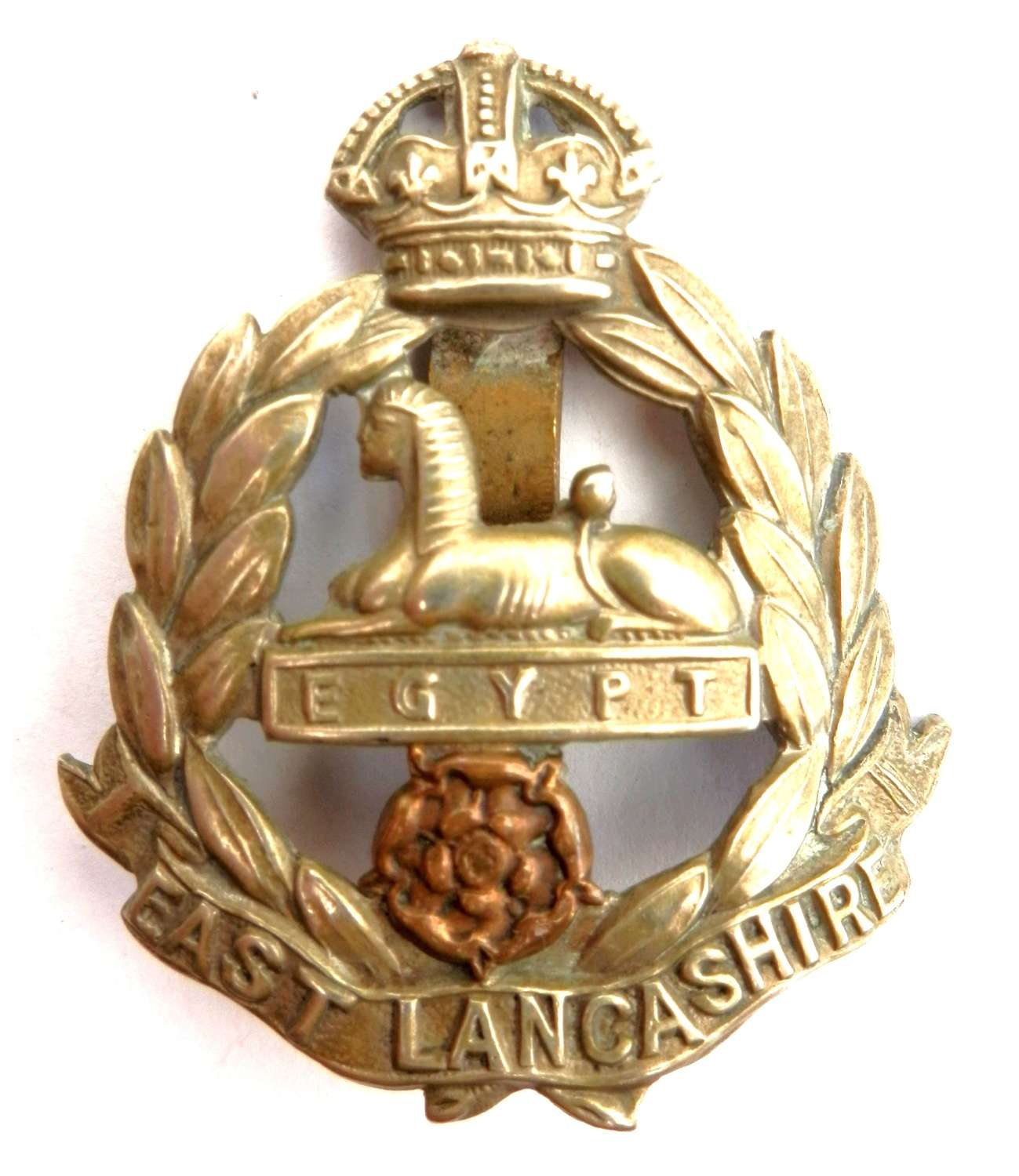 The East Lancashire Regiment Cap Badge.